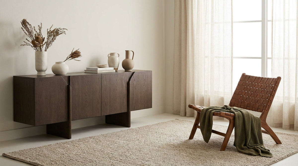 Curated home furniture — oak sideboard and lounge chair