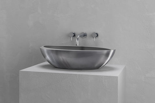 Ovoid Concrete and Metal Vessel Sink for Modern Baths