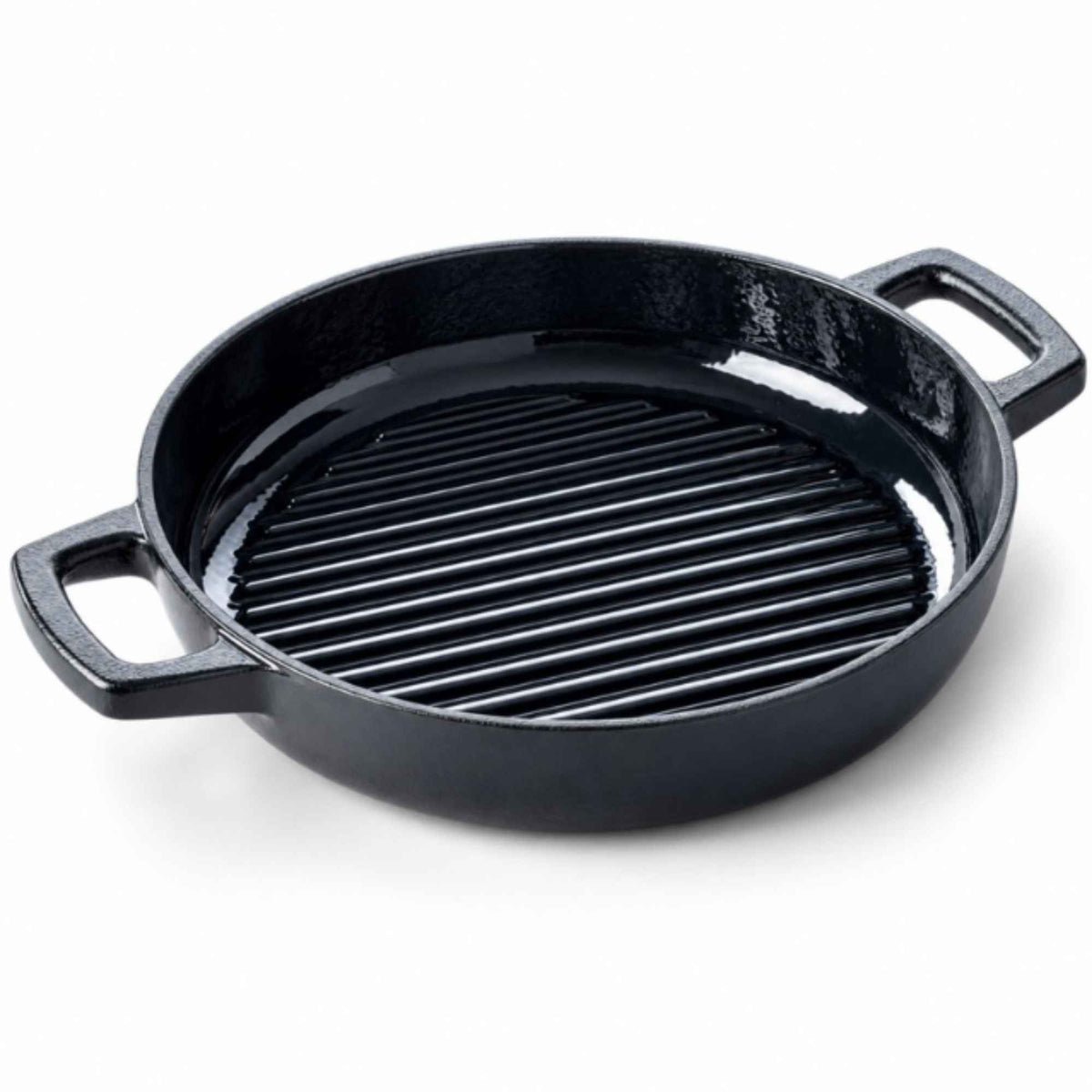 11-inch enameled cast iron grill pan with raised ridges searing steak on a kitchen stovetop