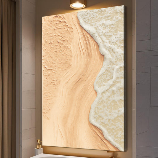 Beige beach coastal canvas wall art above a neutral bed in a calm coastal bedroom