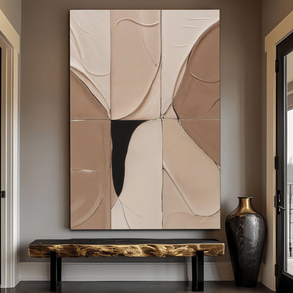 Neutral abstract boho canvas wall art above a rattan headboard in a boho bedroom