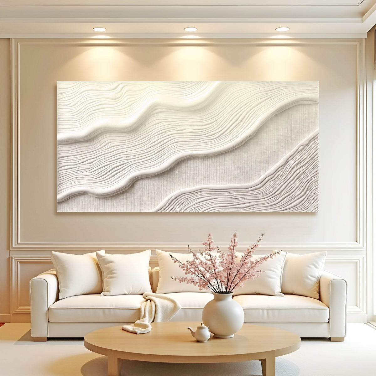 Wide ivory abstract canvas wall art II above a cream sofa in a neutral living room