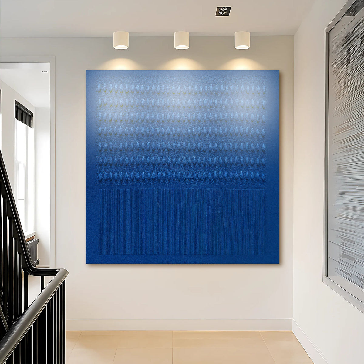 Minimalist blue gradient square canvas wall art above a white dresser in a calm bedroom