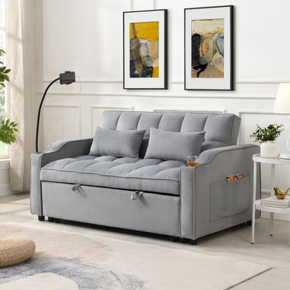 Light gray velvet sleeper loveseat with pullout bed and USB ports in a small apartment living room