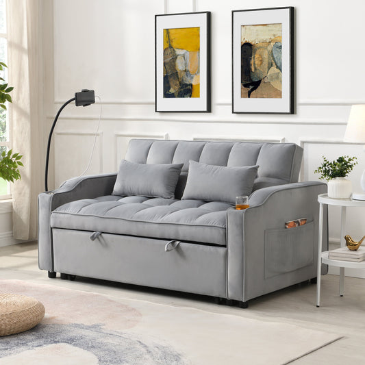 Light gray velvet sleeper loveseat with pullout bed and USB ports in a small apartment living room