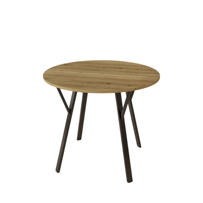 Rustic brown round industrial dining table with black metal frame in a small kitchen nook