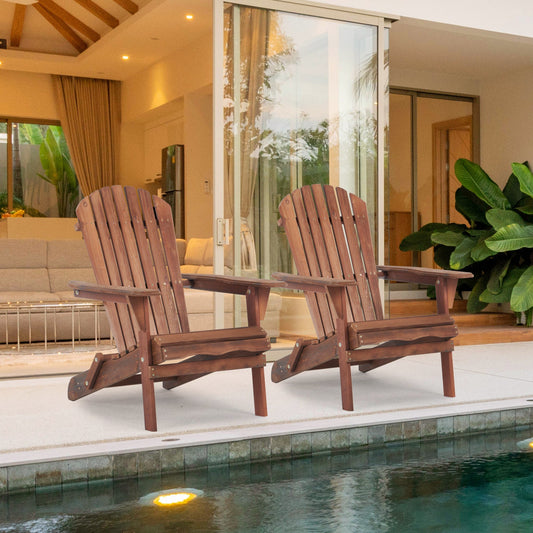 Two natural hemlock wood folding Adirondack chairs with wide armrests on a backyard lawn