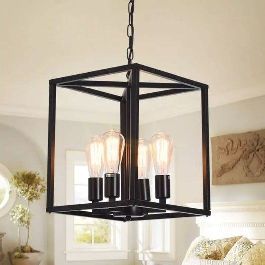 Black industrial 4-light metal cage pendant chandelier hanging over a kitchen island