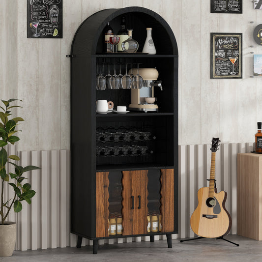 Tall black farmhouse arched wine bar cabinet with wine racks and hanging glasses in a dining room