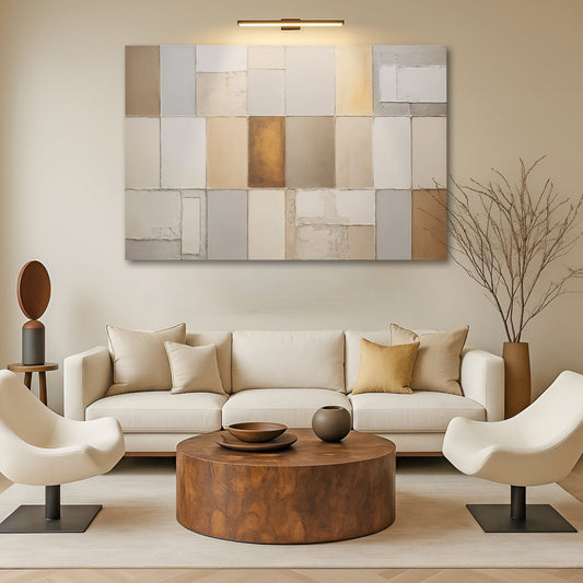 Earth tones patchwork geometric canvas wall art above a mid-century sideboard