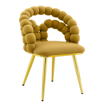 Light blue puffy bubble ball chain upholstered dining chairs around a modern dining table