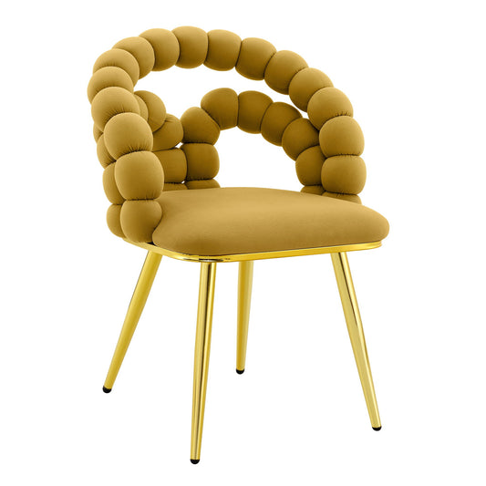 Light blue puffy bubble ball chain upholstered dining chairs around a modern dining table
