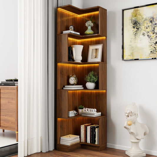 Neutral wood 5 tier corner bookshelf with books and plants in a living room corner