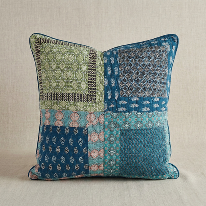 Bohemian Ocean teal and blue cotton patchwork euro sham on a coastal bohemian bed