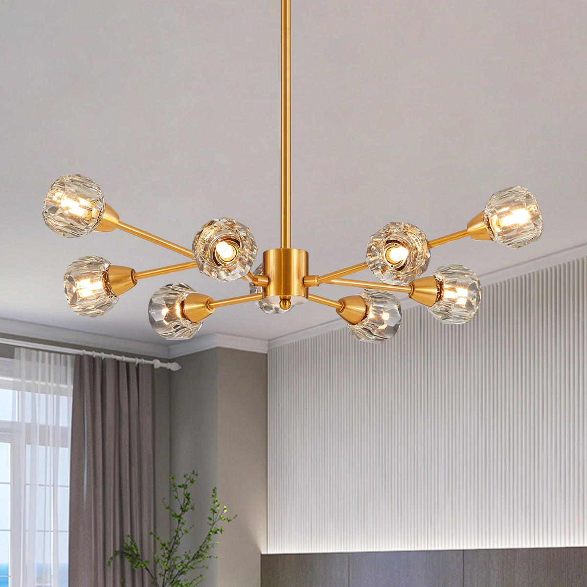 Gold modern crystal chandelier with nine lights in a contemporary living room