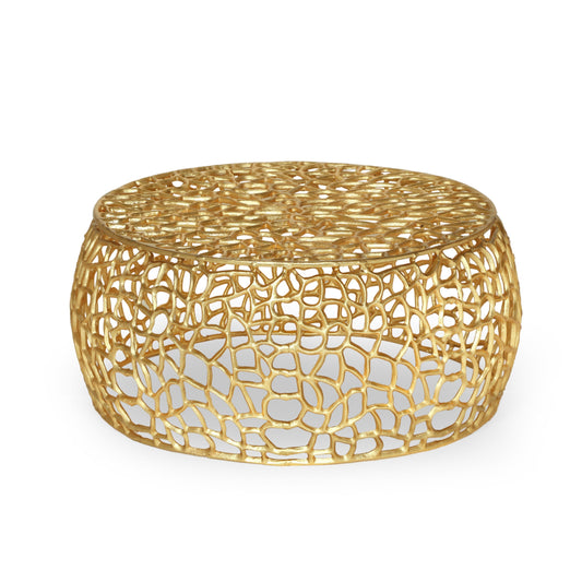 Square low-profile glam mesh coffee table with aluminum frame and gold accents in a lounge area