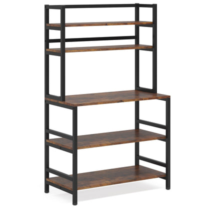 Rustic brown 5 tier bakers rack with hutch holding a microwave and coffee station in a farmhouse kitchen