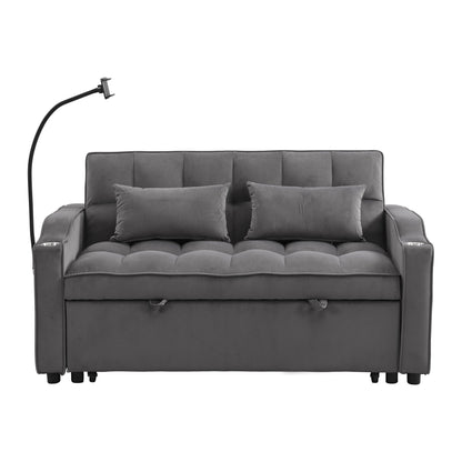 Dark gray velvet sofa bed with pull-out trundle and USB ports in a small guest room