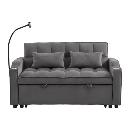 Dark gray velvet sofa bed with pull-out trundle and USB ports in a small guest room
