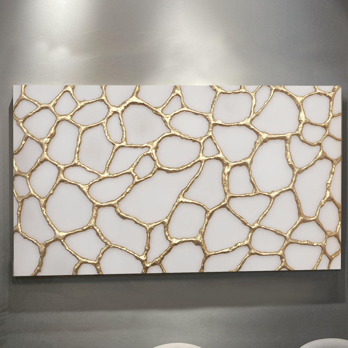 Wide golden neurons abstract canvas wall art above a desk in a home office