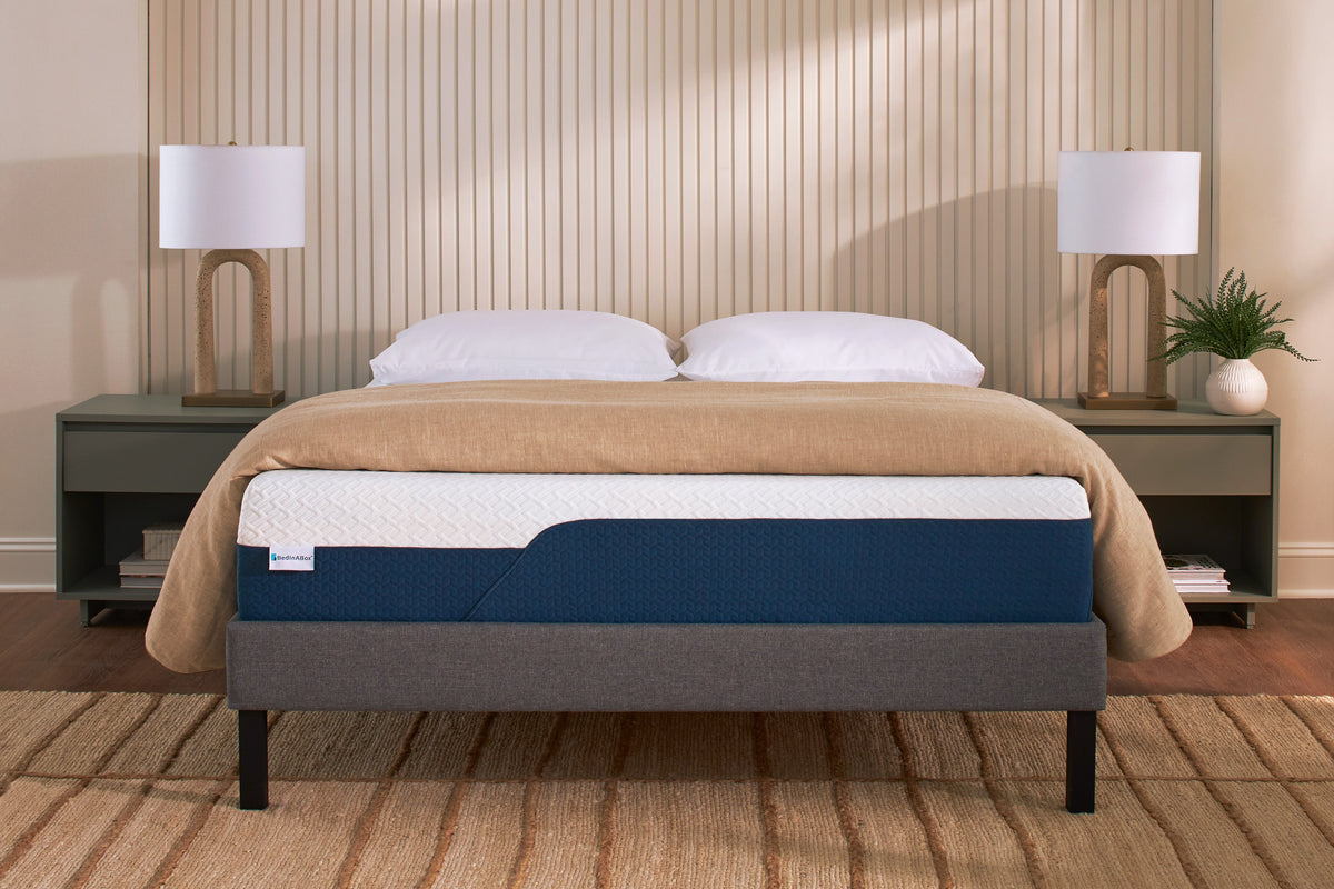 Original 11-inch CoolRest gel memory foam mattress on a platform bed in a bedroom