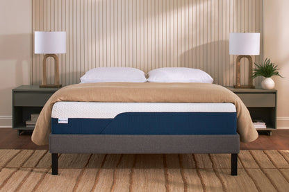 Original 11-inch CoolRest gel memory foam mattress on a platform bed in a bedroom