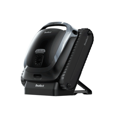 AquaSense 2 cordless robotic pool cleaner scrubbing the waterline of a backyard swimming pool