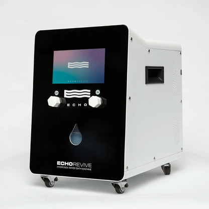Echo Revive hydrogen bath water machine beside a filled bathtub in a calm primary bathroom