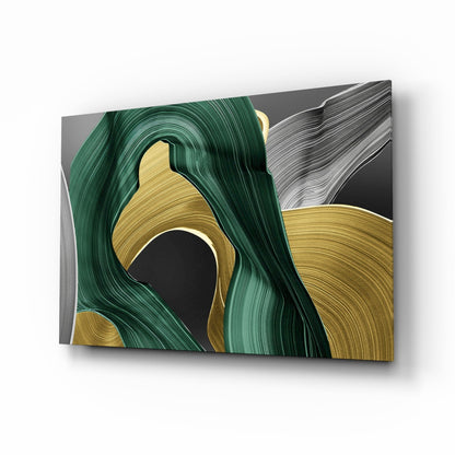 Emerald green and gold swirl brushstroke glass wall art in a glam dining space