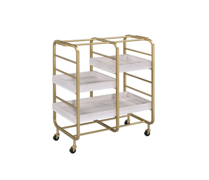 Gold metal serving cart with three removable white washed wooden trays in a dining room