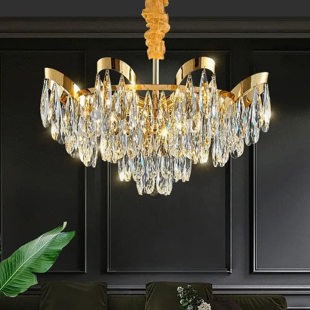 Alice modern crystal sunflower LED chandelier glowing above a dining table