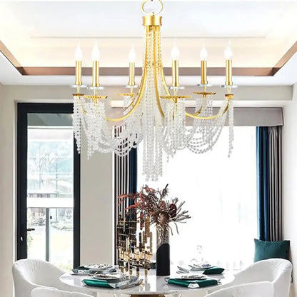 Gold frame classic candle-style LED chandelier in a traditional dining room