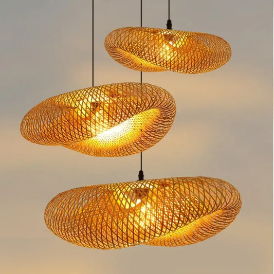 Handmade bamboo wicker wave pendant light with a sculptural rattan shade in an entryway