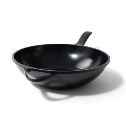12-inch ceramic nonstick wok with comfort-grip handle filled with stir-fried vegetables