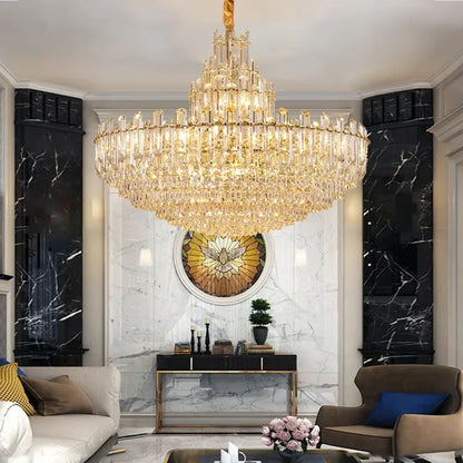 Gold LED crystal chandelier glowing in a luxurious living room