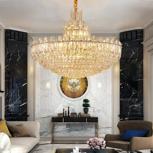 Gold LED crystal chandelier glowing in a luxurious living room