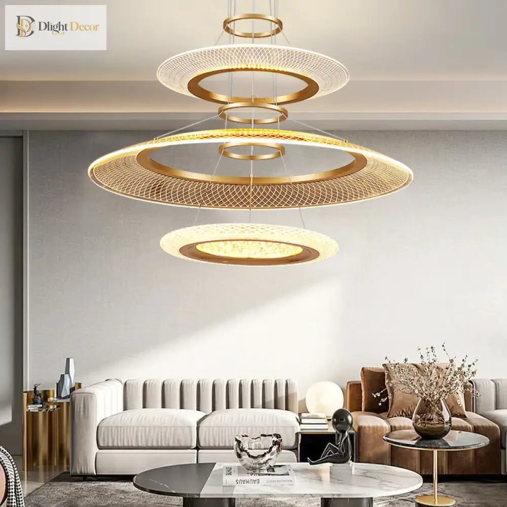 Tiered modern LED ring chandelier glowing above a dining table in an upscale dining room