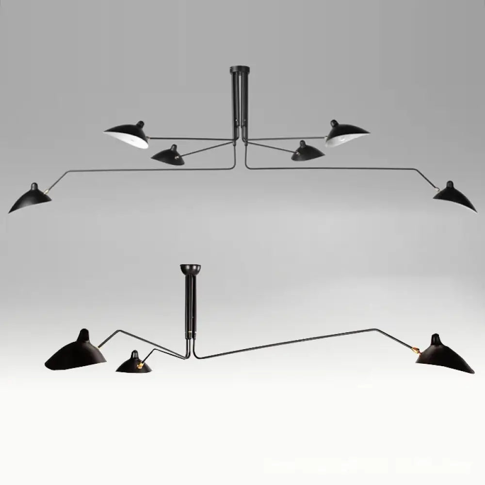 Black Nordic industrial iron spider pendant light with duckbill shades above a dining table