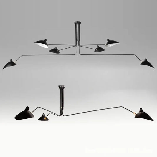 Black Nordic industrial iron spider pendant light with duckbill shades above a dining table