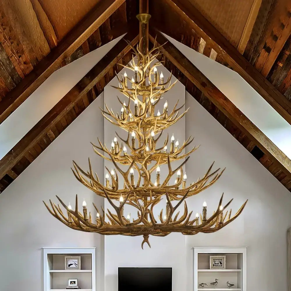 Retro resin antler LED chandelier above a rustic lodge-style dining table