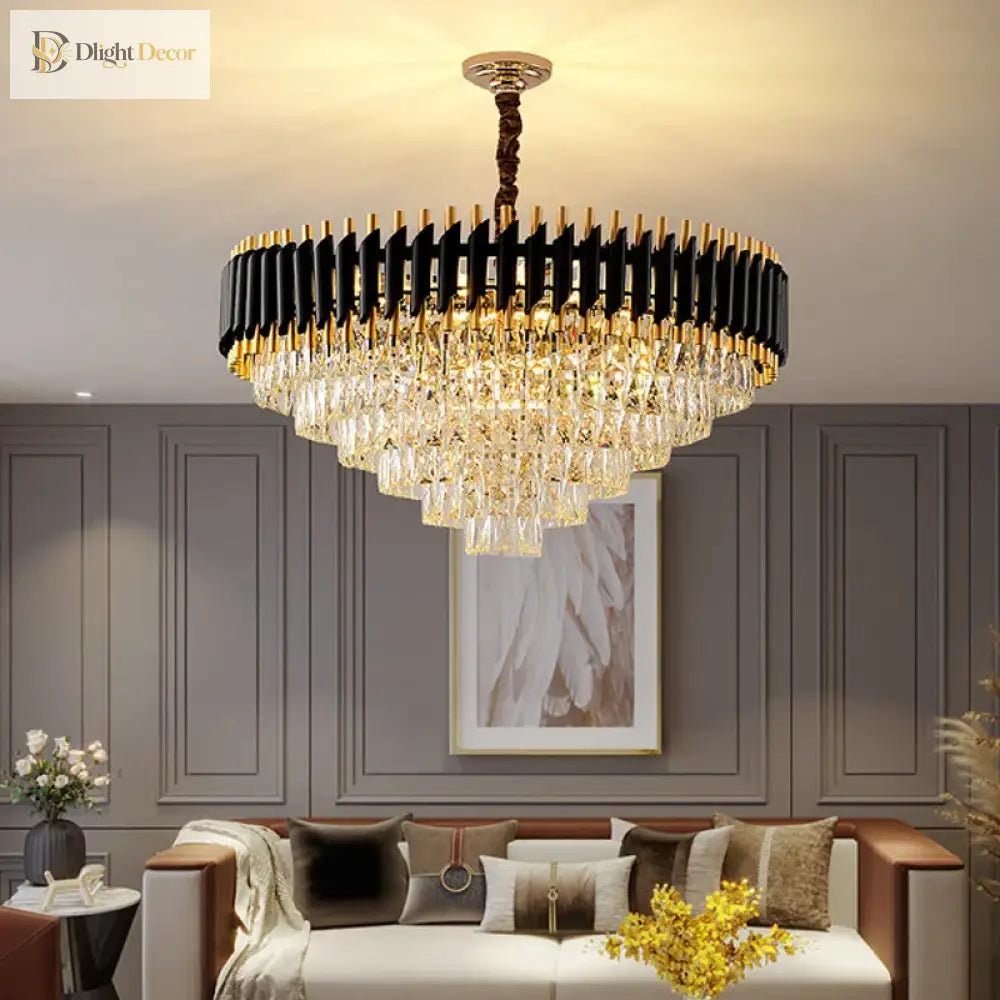 Black and gold crystal LED chandelier above a dining table with matching wall lamps