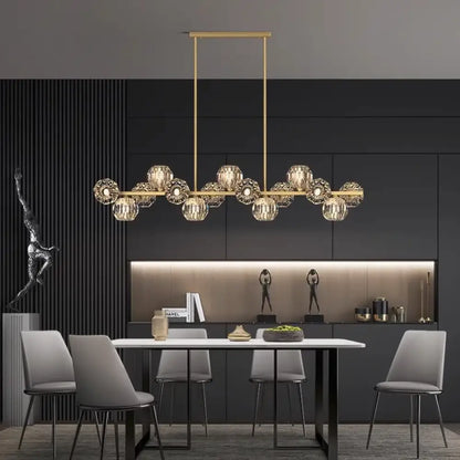 Modern multi-head Signature LED chandelier hanging above a dining table in a stylish dining room