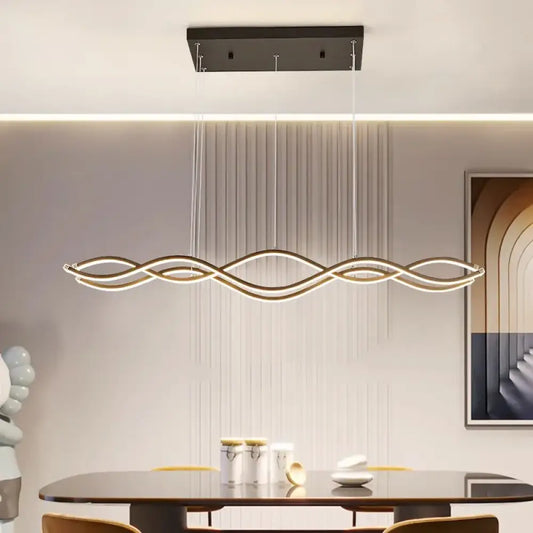 Black Linnea Nordic linear LED chandelier above a modern dining table