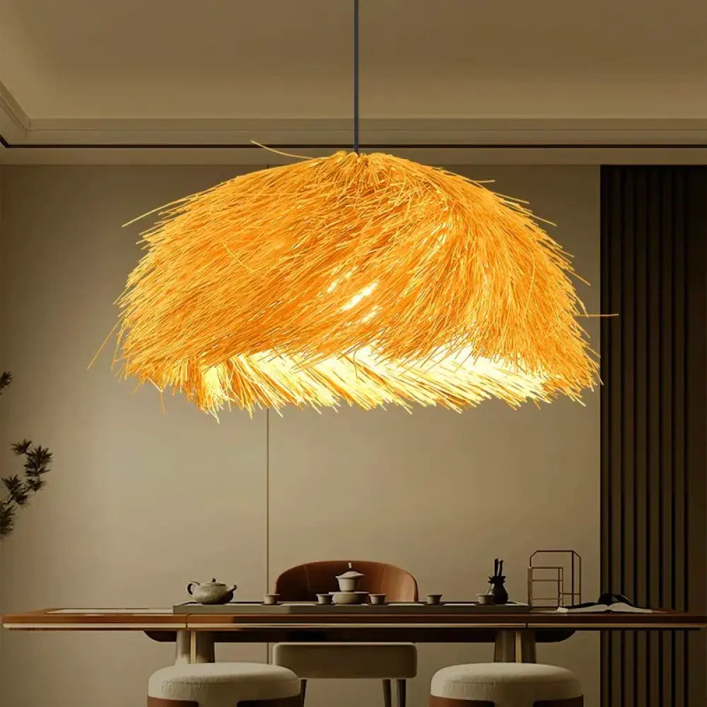 Burlywood smart pendant light with a round shade hanging above a contemporary dining table