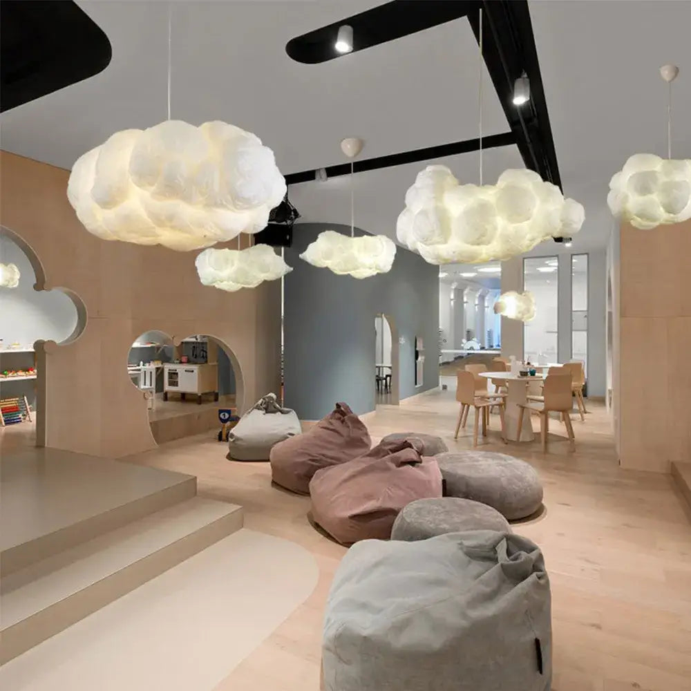 Nordic silk cloud pendant light with a soft sculptural shade glowing in a modern living room