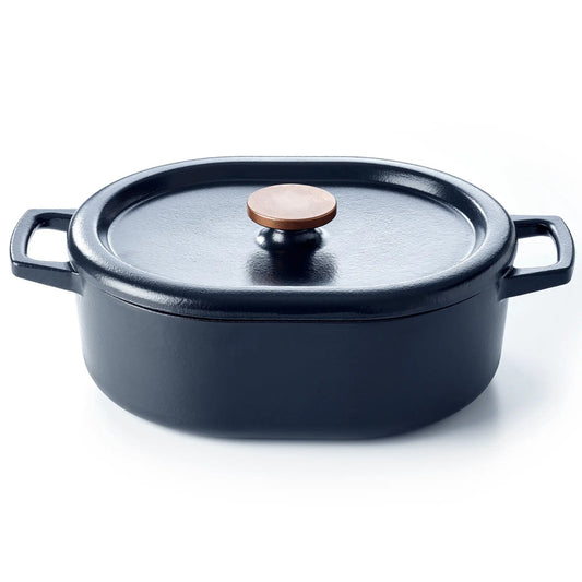 6-quart enameled cast iron oval Dutch oven with lid holding a braised roast on a dining table
