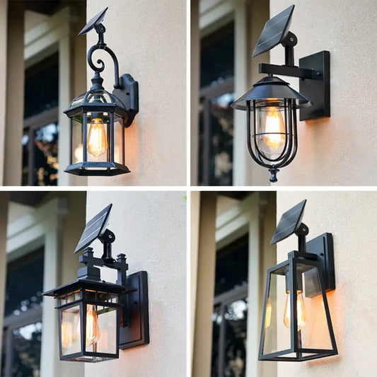 Black aluminum Sophia solar outdoor wall light lantern with glass panels on a front porch