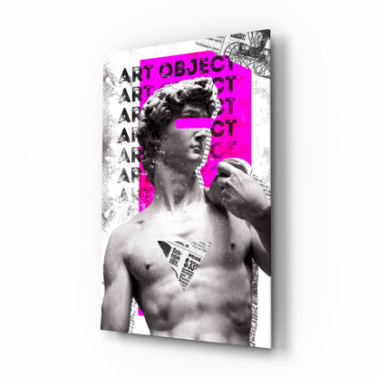 David marble bust collage with magenta block and newsprint glass wall art in a study