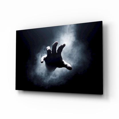 Pale hand reaching through fog from black void glass wall art in a home theater