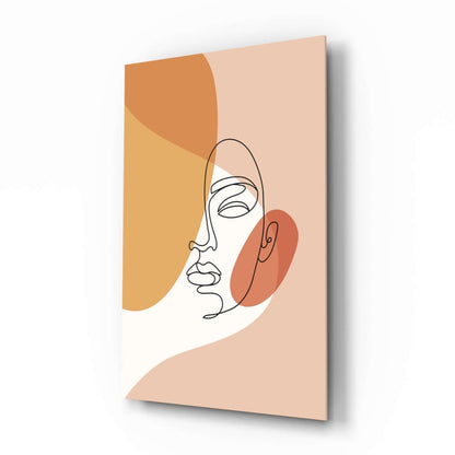 Boho line drawing woman face glass wall art with peach and marigold shapes in a calm bedroom